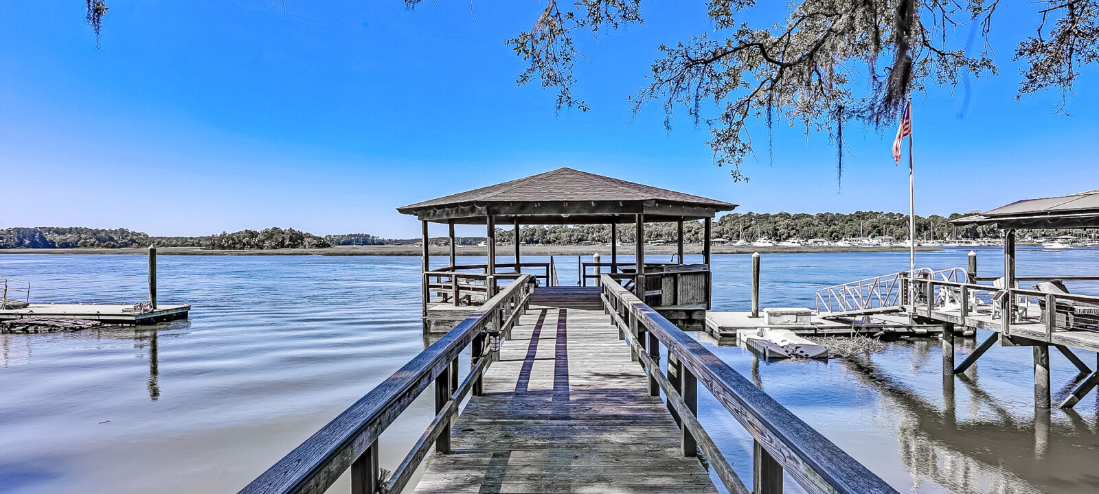 Waterfront dock with covered pier head